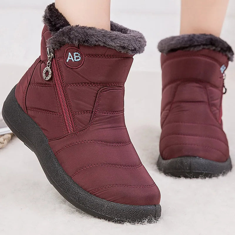 Stylish women's ankle boots with fur, low heels, waterproof winter shoes