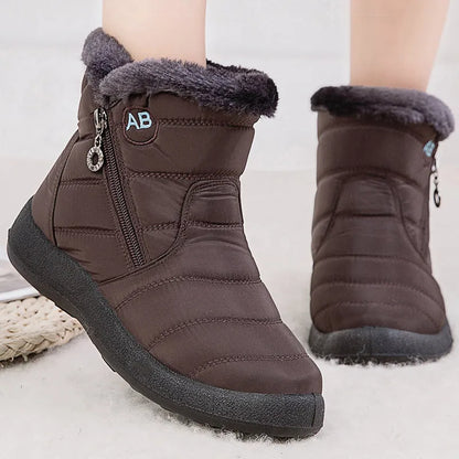 Stylish women's ankle boots with fur, low heels, waterproof winter shoes
