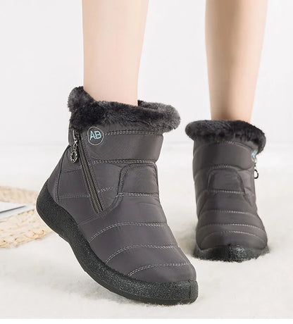 Stylish women's ankle boots with fur, low heels, waterproof winter shoes