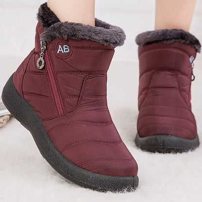 Stylish women's ankle boots with fur, low heels, waterproof winter shoes