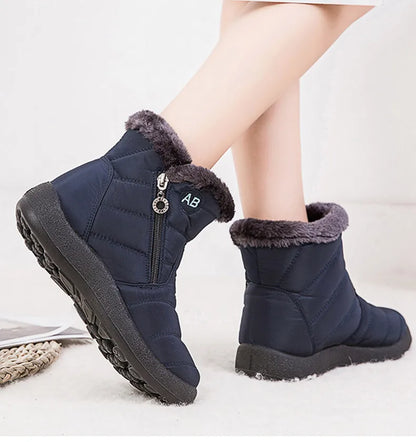 Stylish women's ankle boots with fur, low heels, waterproof winter shoes