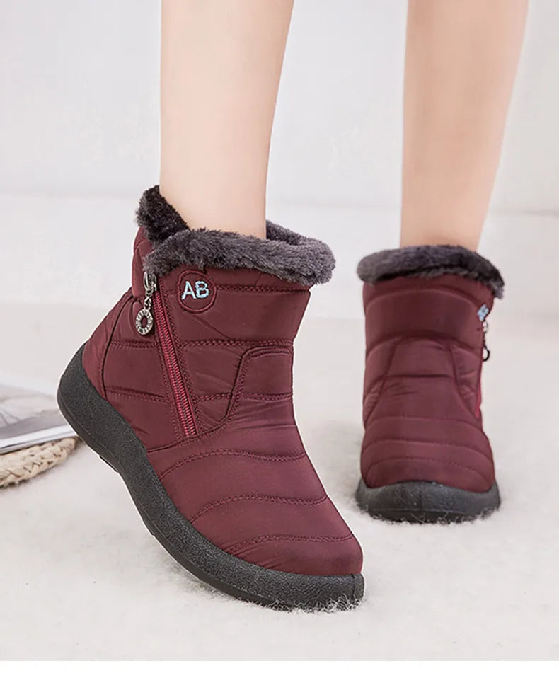 Stylish women's ankle boots with fur, low heels, waterproof winter shoes