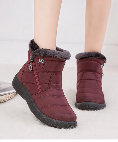 Stylish women's ankle boots with fur, low heels, waterproof winter shoes