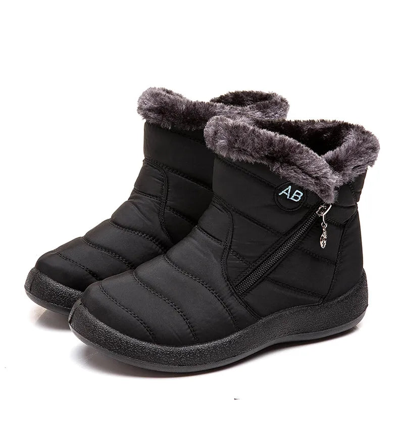 Stylish women's ankle boots with fur, low heels, waterproof winter shoes
