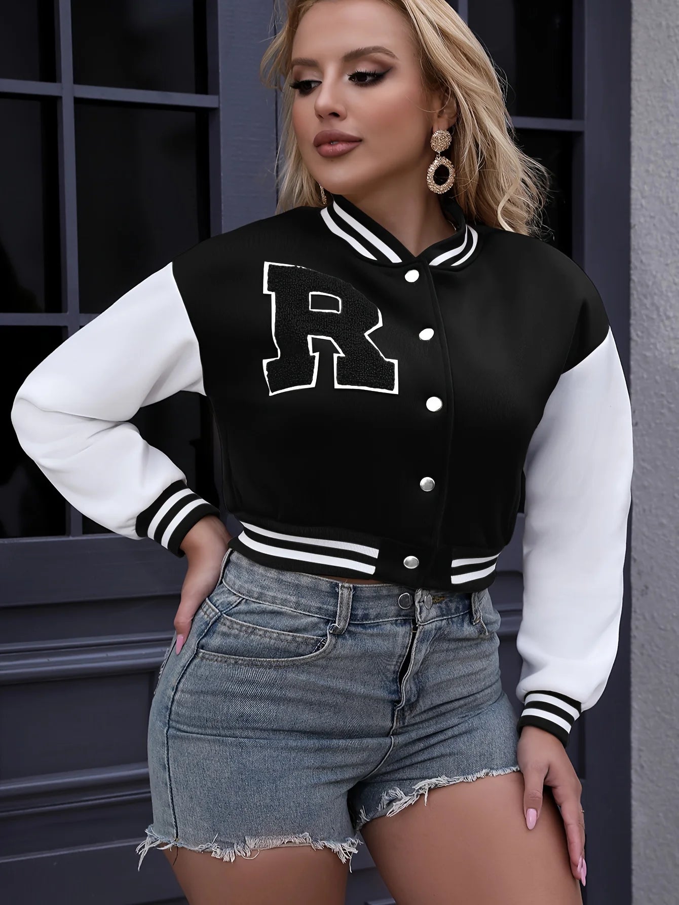 Women’s lightweight bomber jacket with button front and long sleeves